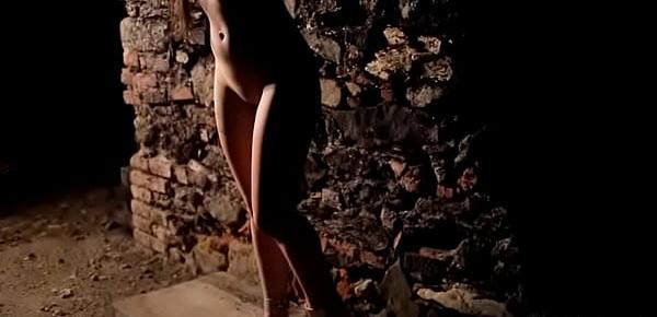  Isabella naked and shackled to the wall in a medieval torture room